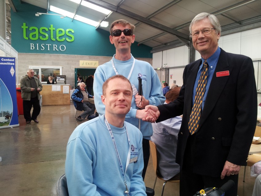 Photo of Kelvin M0AID and Quentin GW3BV with Graham Coomber G0NBI RSGB General Manager