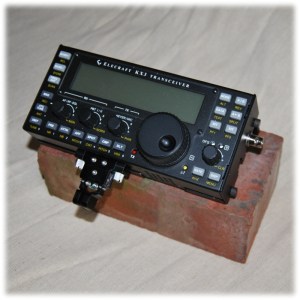 Photo of KX3 on a house brick for size comparison